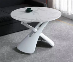 Tabella tal-pranzu tonda taċ-ċeramika li testendi